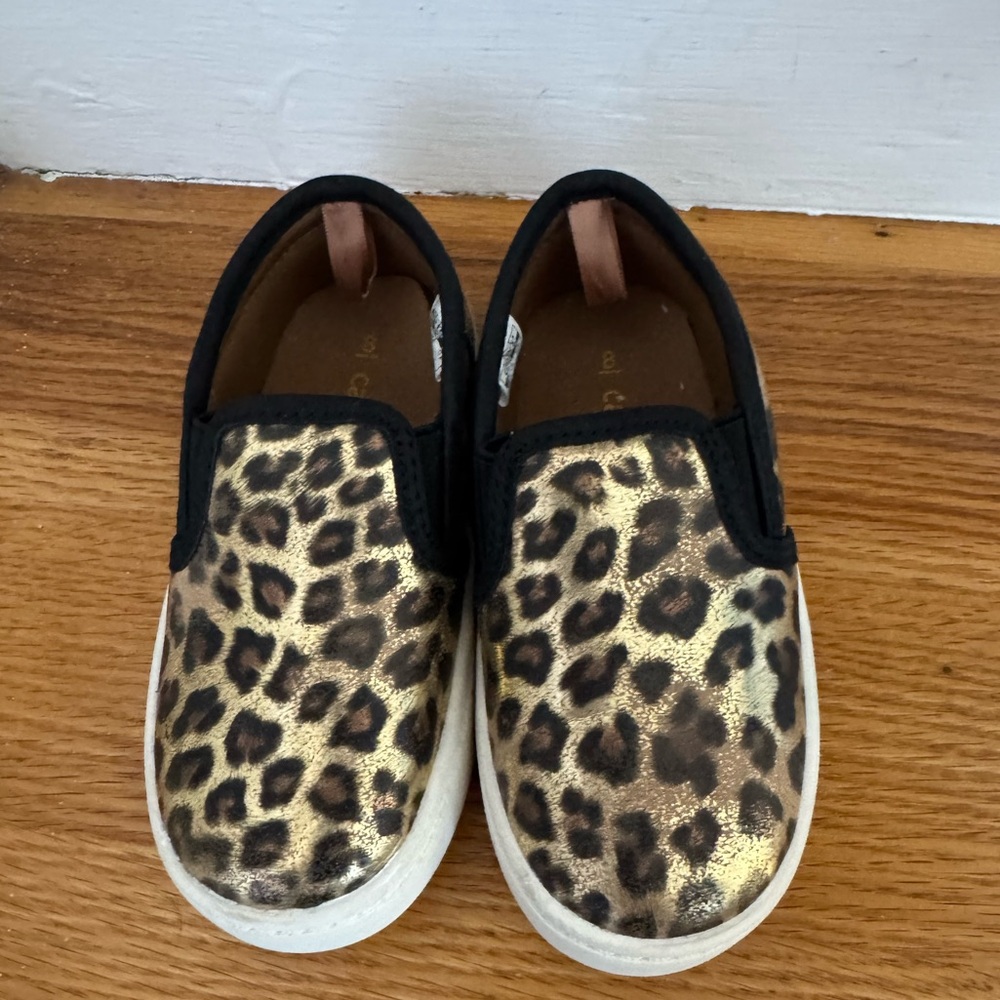 Gently used toddler leopard slide sneakers. Carters brand size 8.